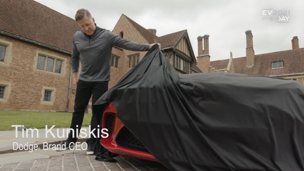 Dodge CEO Tim Kuniskis giving a teaser of a future Dodge EV. Dodge has confirmed it will launch an all-electric EV muscle car by 2024